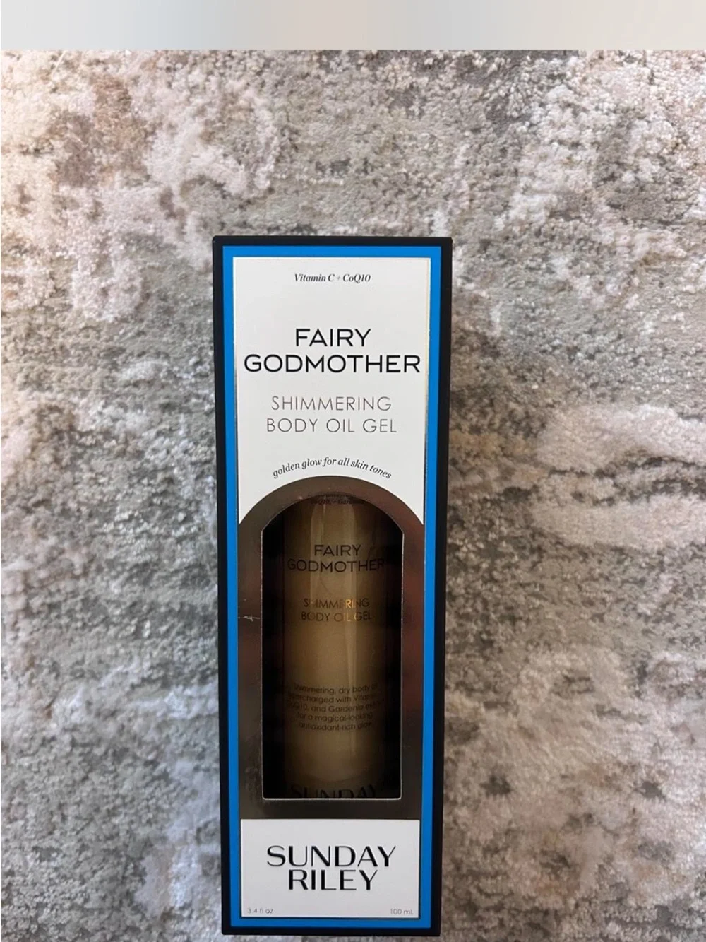 Sunday Riley Fairy Godmother Shimmering Body Oil Gel - Blue and Gold Accents